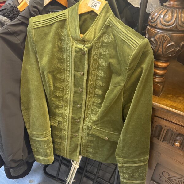 Front view of a green Joe Browns velvet jacket with embroidery.