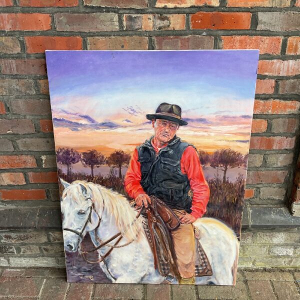 Vintage oil painting of John Wayne on horseback by W Nims.