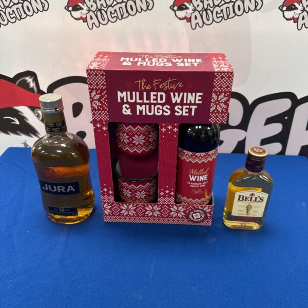 Festive mulled wine gift set with Jura and Bells whiskey bottles.