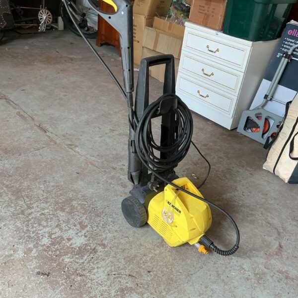 Karcher B302 power washer for cleaning outdoor spaces.