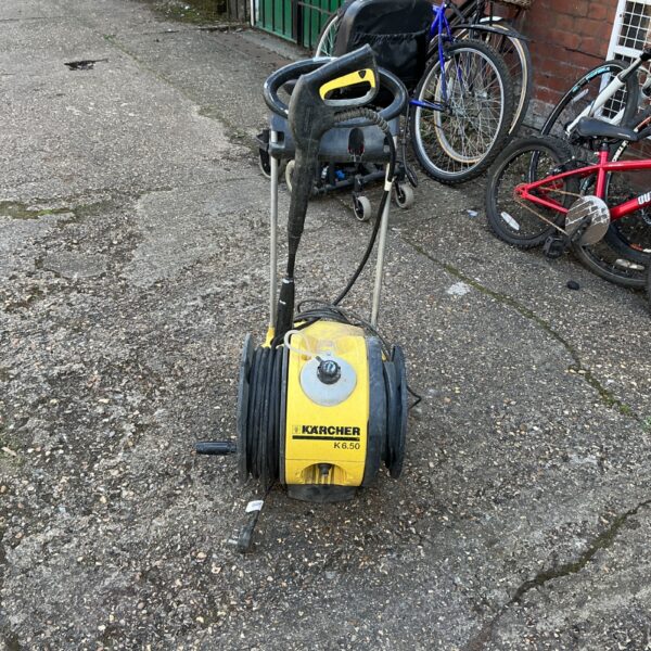 Used Karcher K6.50 pressure washer for garden cleaning.