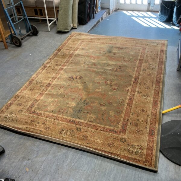Intricate floral design on a handmade Persian Keshan rug.