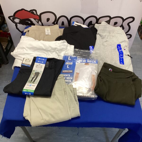 Bundle of new Kirkland mens crew neck T-shirts in packaging.