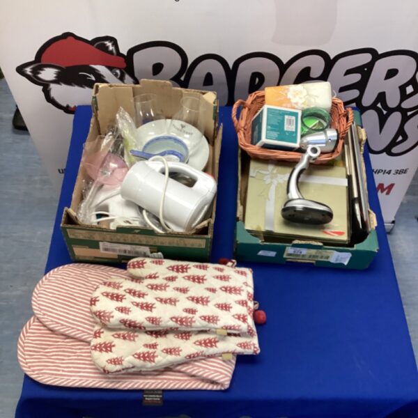 Mixed kitchen appliance clearance lot with travel kettle and placemats.