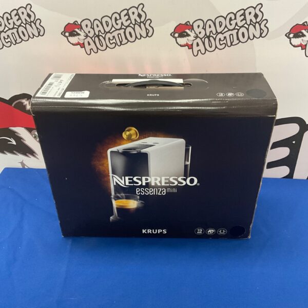 Compact Krups Nespresso Essenza Mini coffee machine for home use.