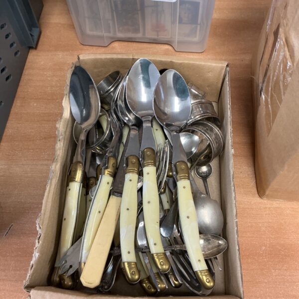 Vintage Laguiole French cutlery set with brass rivets.