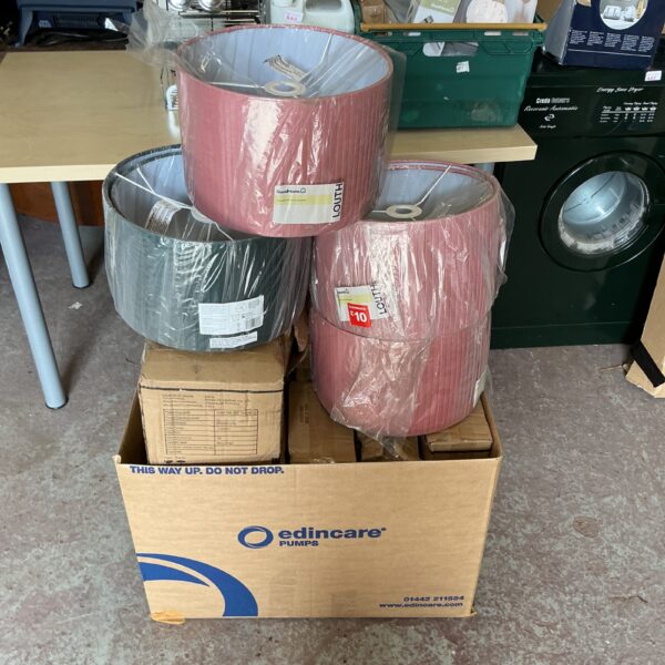 New pink fabric lamp shades in original packaging.