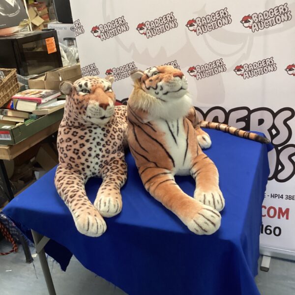 Large cuddly tiger and leopard plush toys for collectors.