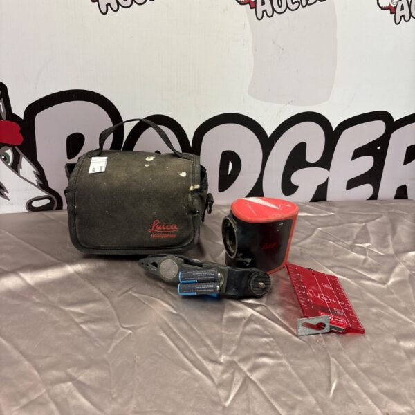 Leica laser measuring tool in a padded carrying case.