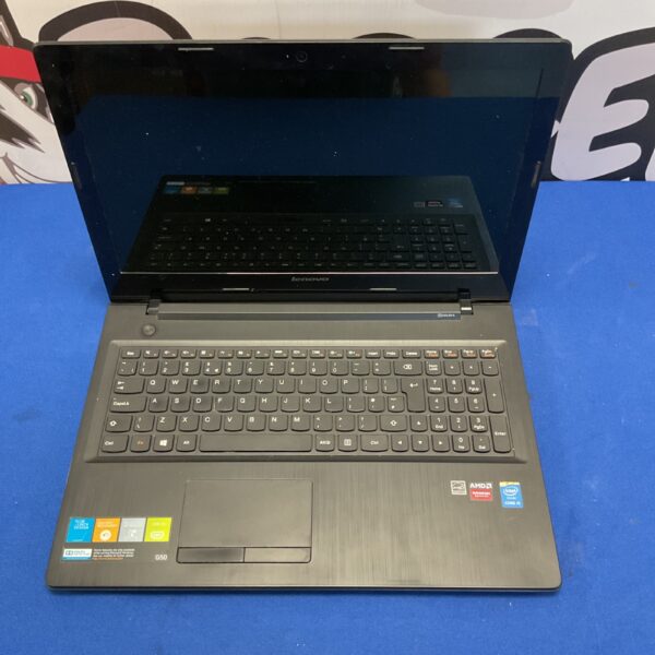 Used Lenovo laptop computer showing keyboard and screen.