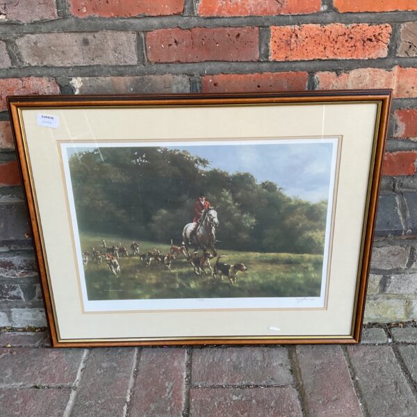 Signed limited edition hunting print with huntsman and hounds.