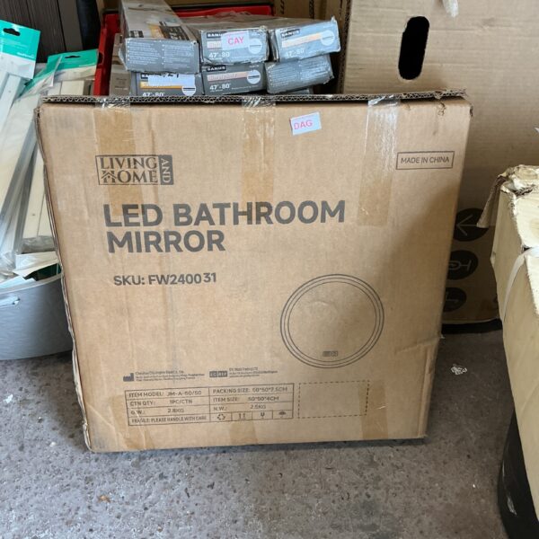 Living Home circular heated bathroom mirror in original packaging.