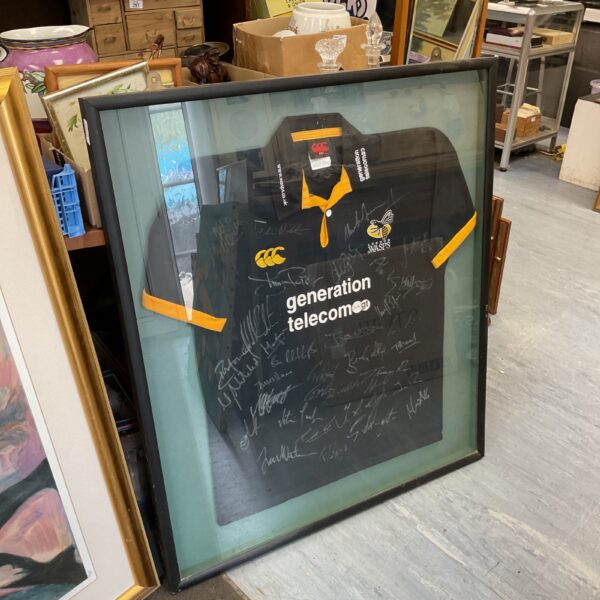 Framed London Wasps signed rugby shirt, team autographs visible.
