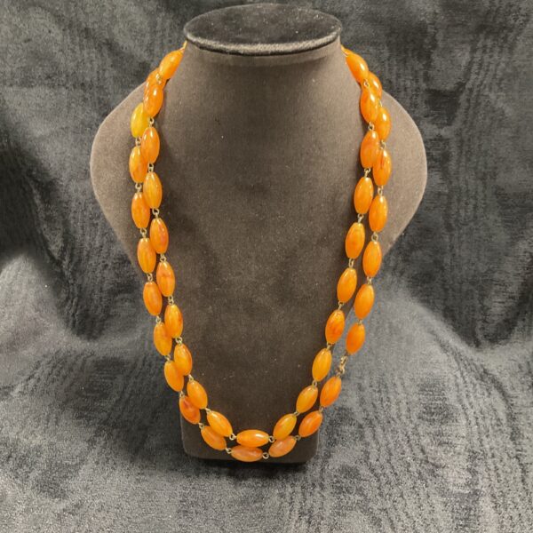 Long amber bead necklace, vintage style costume jewellery.