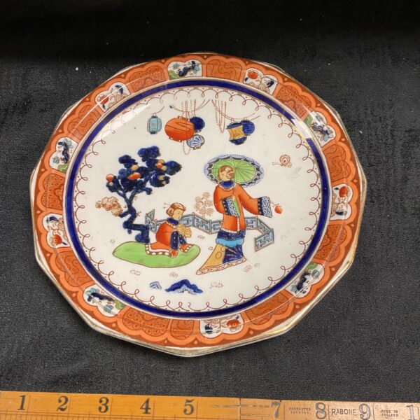 Antique Losol Ware Nankin plate with hand-painted scene.