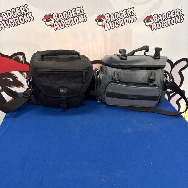 Two camera bags, a Lowepro and a Tamashi, for photography equipment.