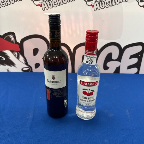 Vintage bottles of Luxardo Kirsch liqueur and Barbadillo sherry blend.