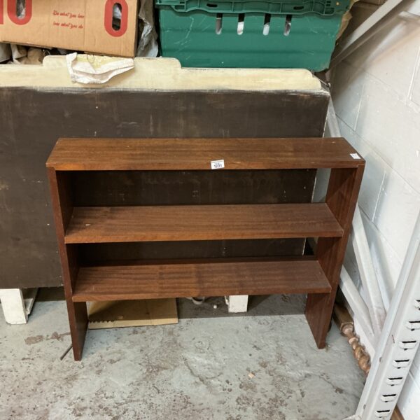 Vintage mahogany bookcase for books and home decor.