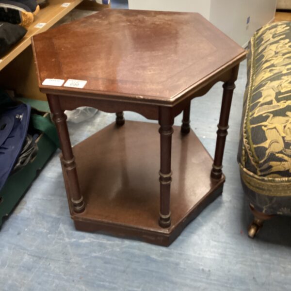 Antique mahogany hexagonal side table with turned legs.