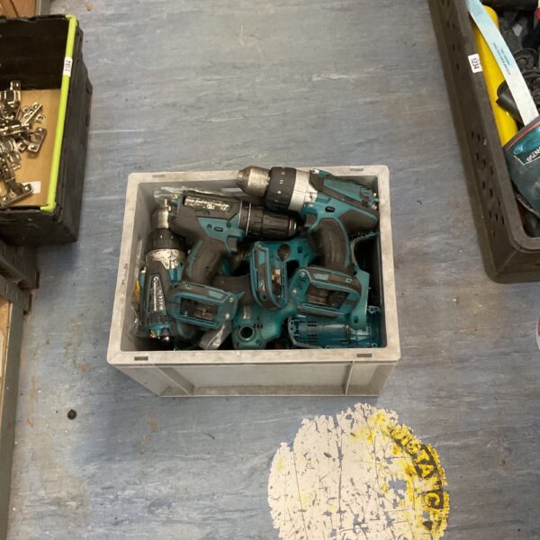 Used Makita 18V LXT brushless cordless drill driver power tool.