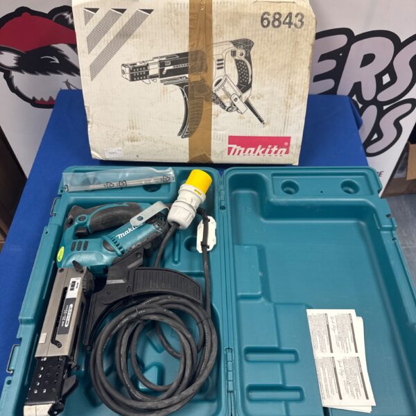 Used Makita 6843 autofeed nail gun for woodworking projects.