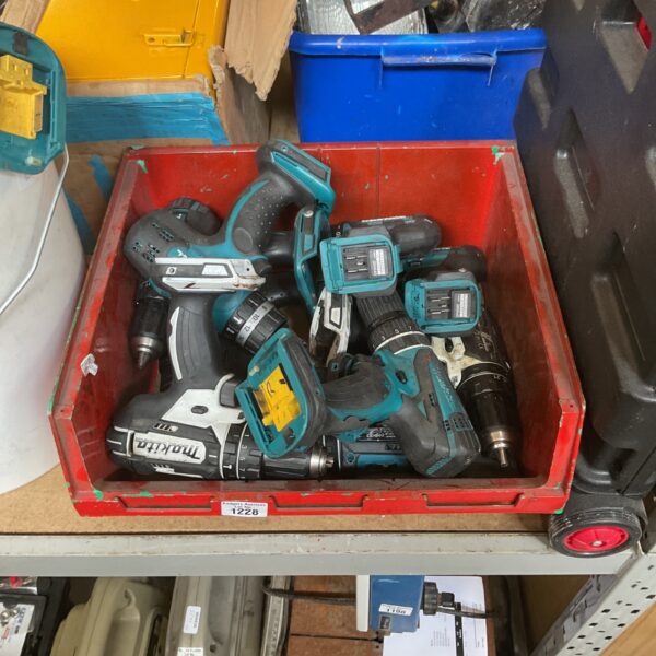 Used Makita HP457D combi drill kit with accessories.