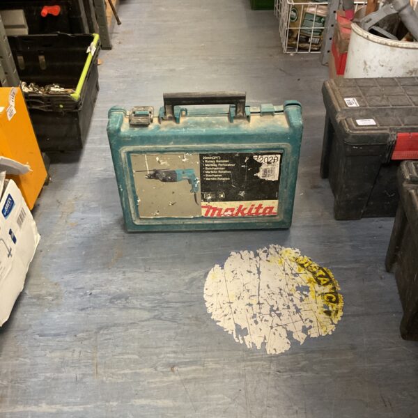 Vintage Makita HR2020 rotary hammer drill in original case.