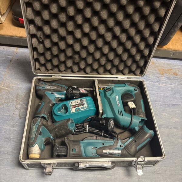 Makita power tool kit in a teal carrying case.
