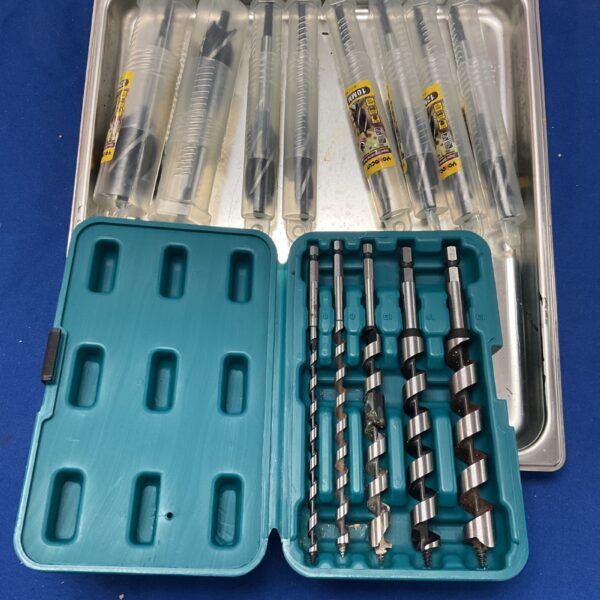 Selection of Makita and Yokocut wood boring bits for woodworking projects.