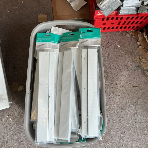 Close-up of Marlos 400mm worktop corner connectors in a box.