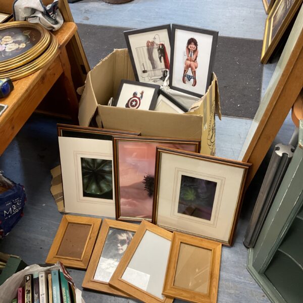 Large lot of Marvel prints and oak frames for collectors.