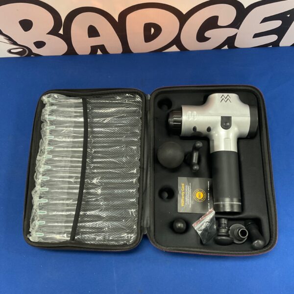 Handheld massage gun with multiple attachments for muscle recovery.