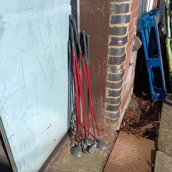 Vintage Maxfli Granite golf club set displayed outdoors.