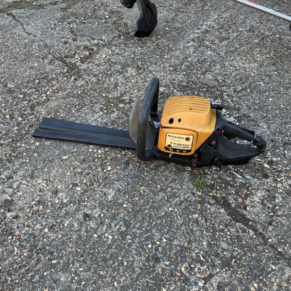 Vintage McCulloch Virginia petrol chainsaw, front view.
