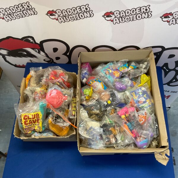 Two boxes of vintage McDonald’s Happy Meal toys for collectors.
