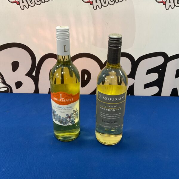 Wine bottles lot featuring McGuigan Chardonnay and Lindeman’s Semillon.