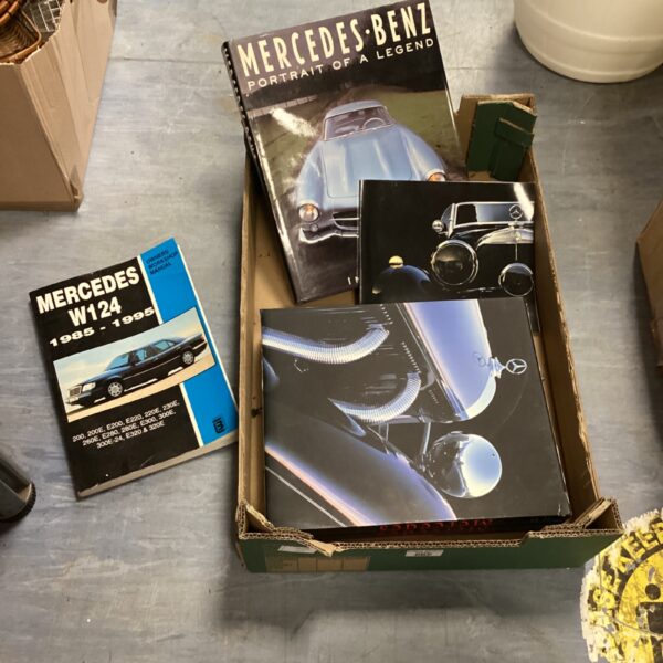 Mercedes-Benz books collection including W124 and Portrait of a Legend.