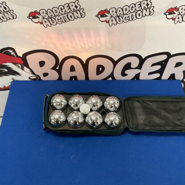 Close-up of a vintage metal boules set for pétanque.