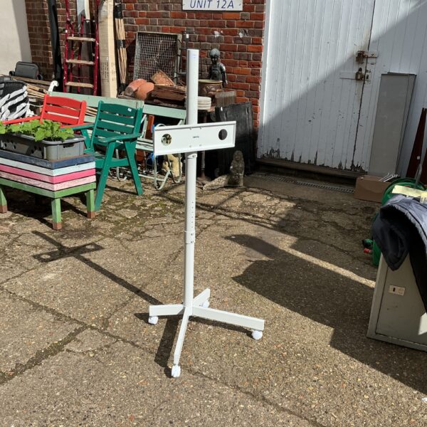 Metal wheeled display stand for presentations and displays.