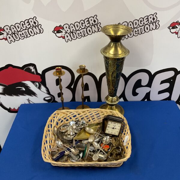 Vintage metalware basket with brass vase and candlesticks.