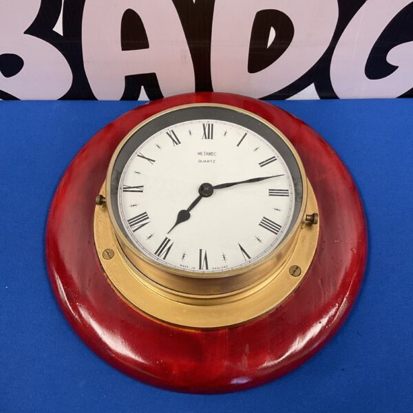 Vintage Metamec ships clock with Roman numerals on a white dial.