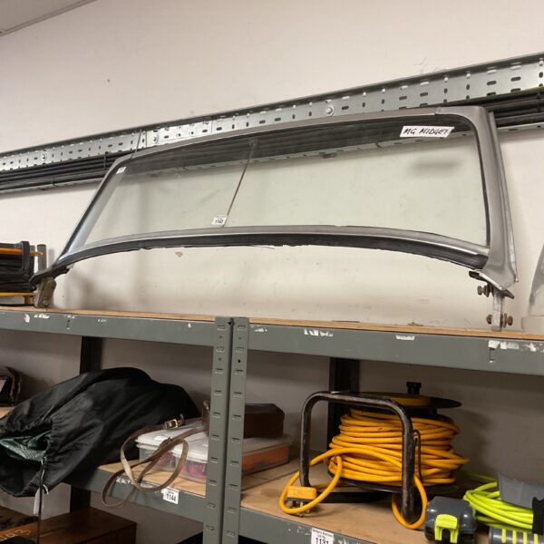 Vintage MG Midget windshield for classic car restoration.