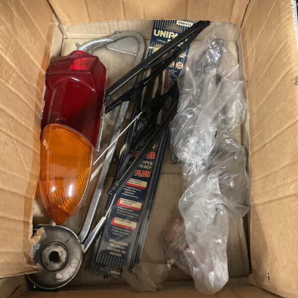 Classic MGB rear light lens and spares collection.