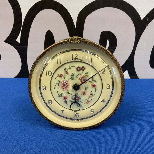 Vintage mid-century Regent of London alarm clock with embroidered face.
