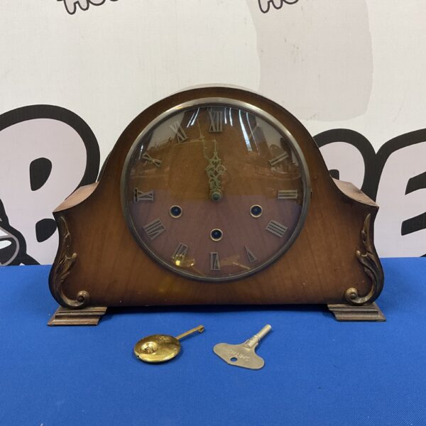 Vintage mid-century Smith mantle clock with wooden case.