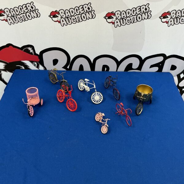 Close-up of a miniature bicycle collection, vintage style.