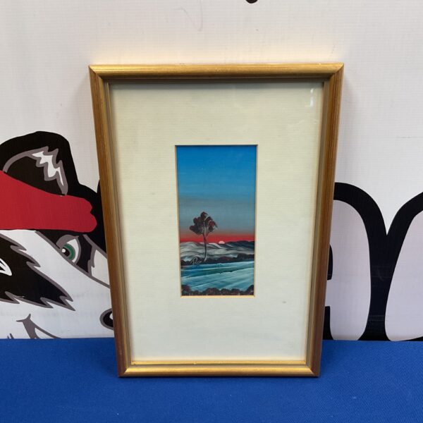 Signed miniature sunset painting with a silhouetted tree.