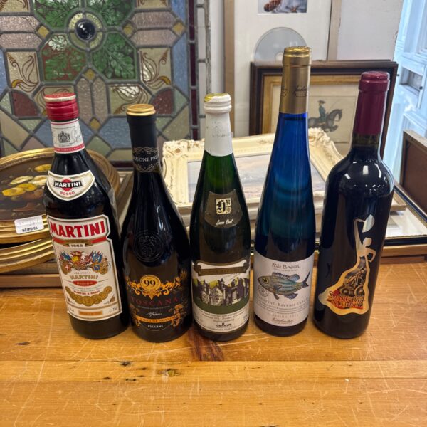 Mixed alcohol lot featuring Martini, Sangria, and wine bottles.
