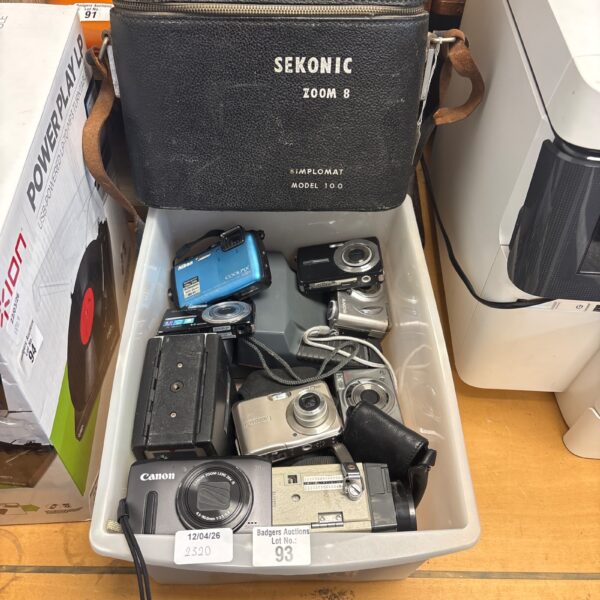 Mixed camera lot including Nikon Coolpix and Canon PowerShot cameras.