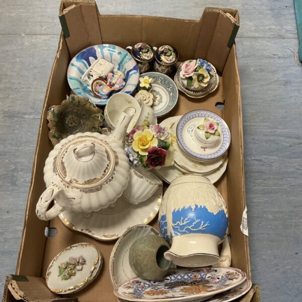 Vintage mixed china collection with floral Randor bone china pieces.